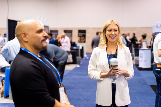 Lauren Smiling with IGA24 Attendee - Melissa